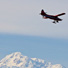 Alaska bush plane in front of Mt. McKinley near Talkeetna. 